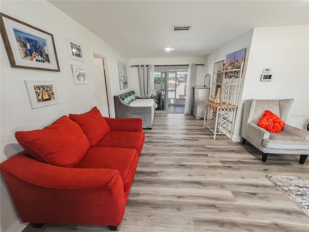 1810 Anchor Avenue DeLand, FL 32720 - Photo 4 of 29 a living room with furniture and a couch