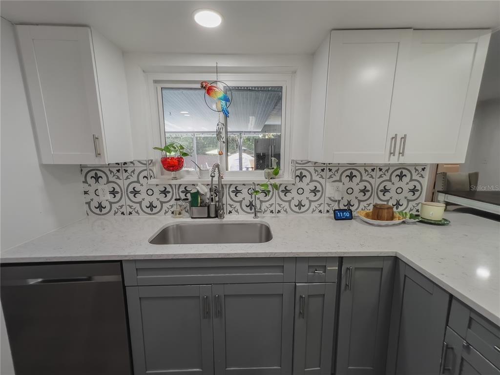 1810 Anchor Avenue DeLand, FL 32720 - Photo 9 of 29 a bathroom with a sink and a mirror