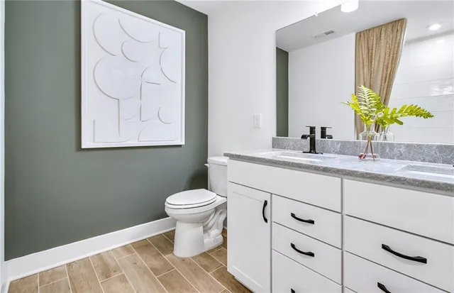 a bathroom with a sink and a toilet