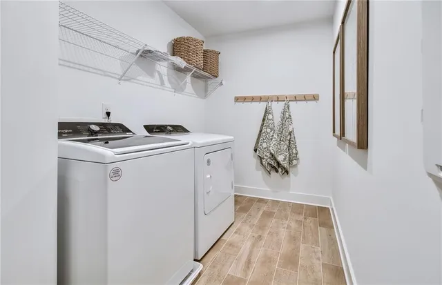 a utility room with dryer and washer