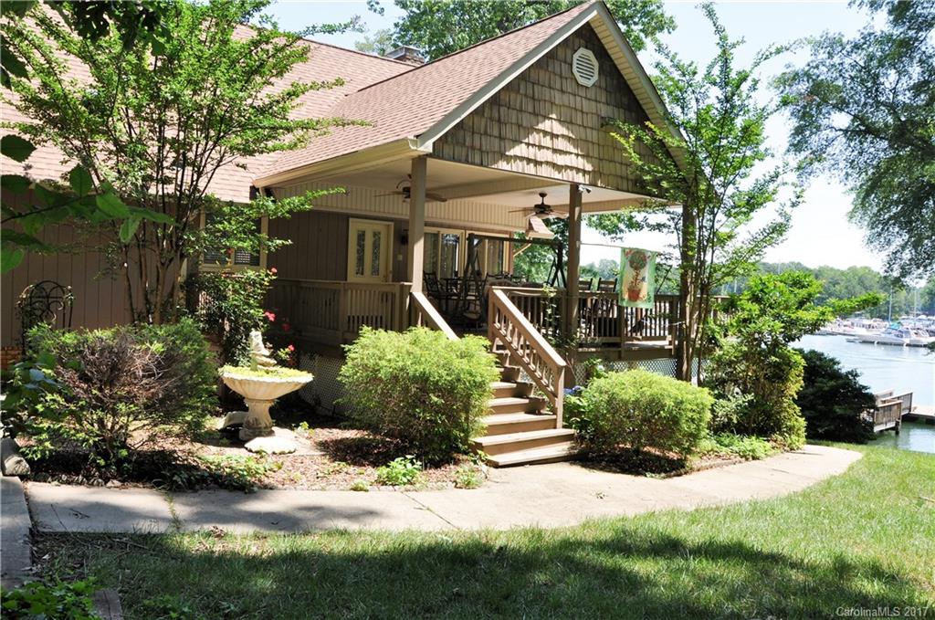 20001 Colony Point Lane Cornelius, NC 28031 - Photo 3 of 5 a front view of a house with a yard