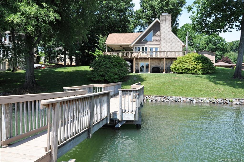 20001 Colony Point Lane Cornelius, NC 28031 - Photo 5 of 5 a front view of a house with garden