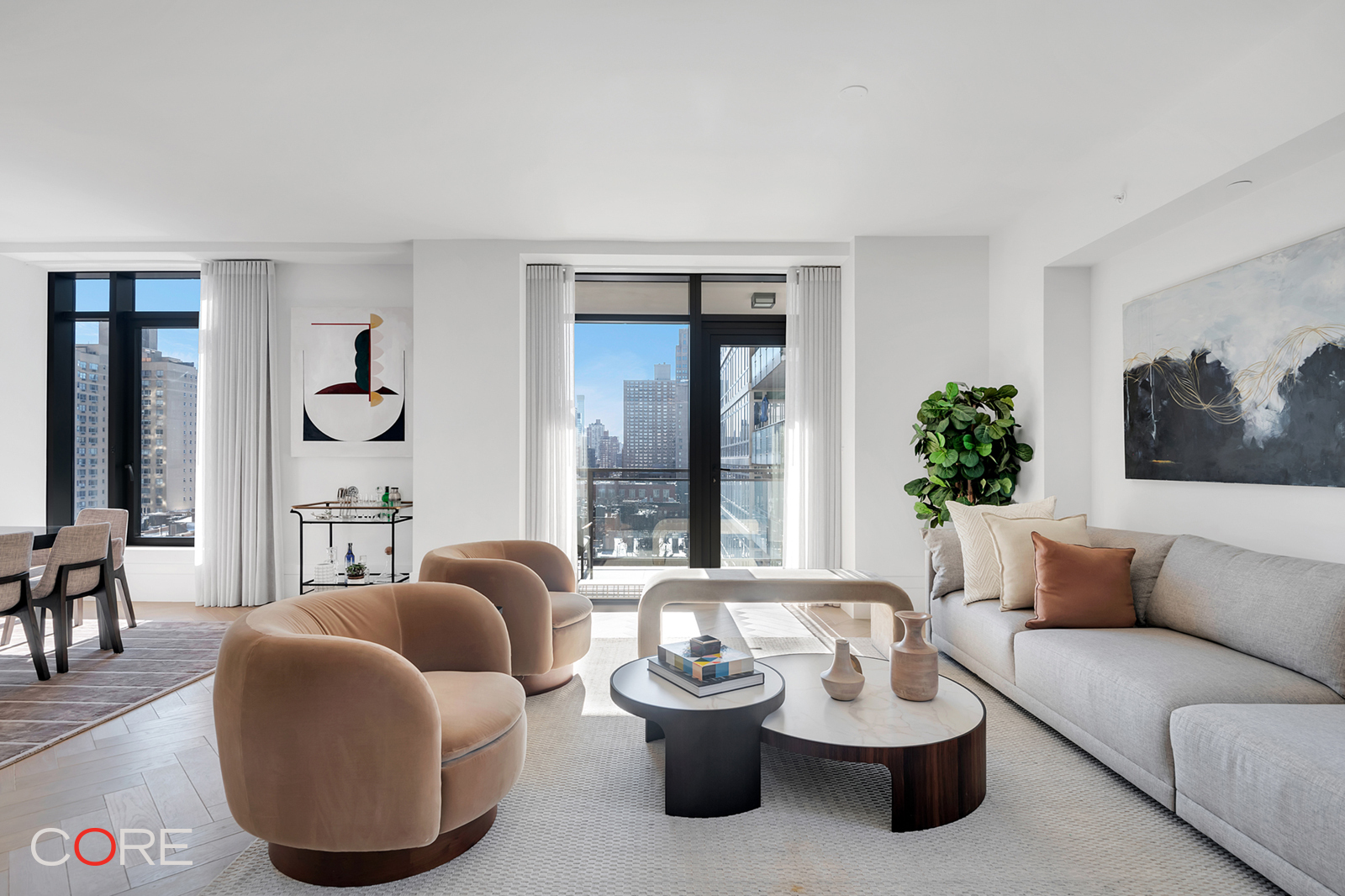 310 East 86th Street, Unit 11C Manhattan, NY 10028 - Photo 3 of 25 a living room with furniture and a large window
