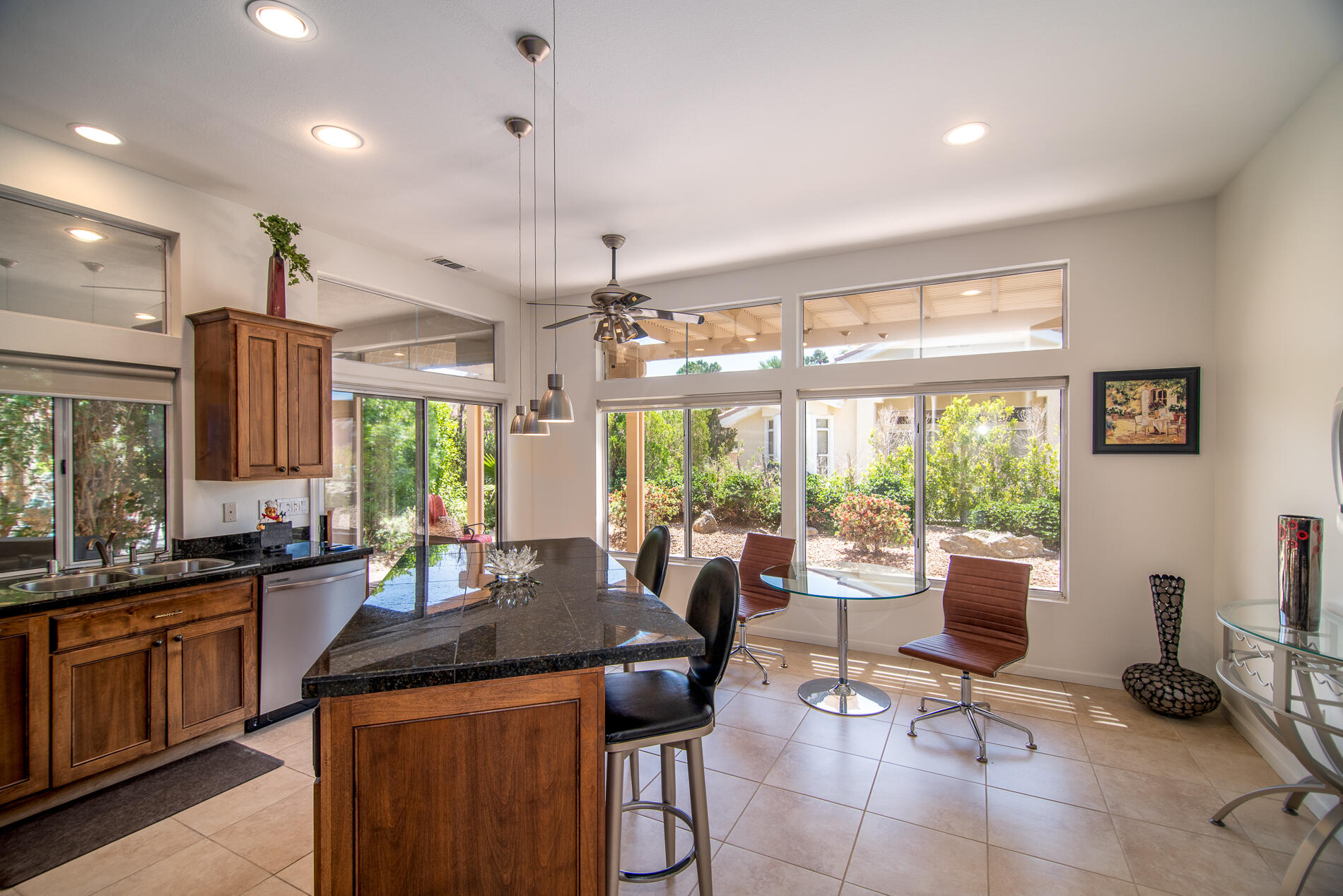 78379 Moongold Road Palm Desert, CA 92211 - Photo 18 of 40 a view of a dining room with furniture window and outside view