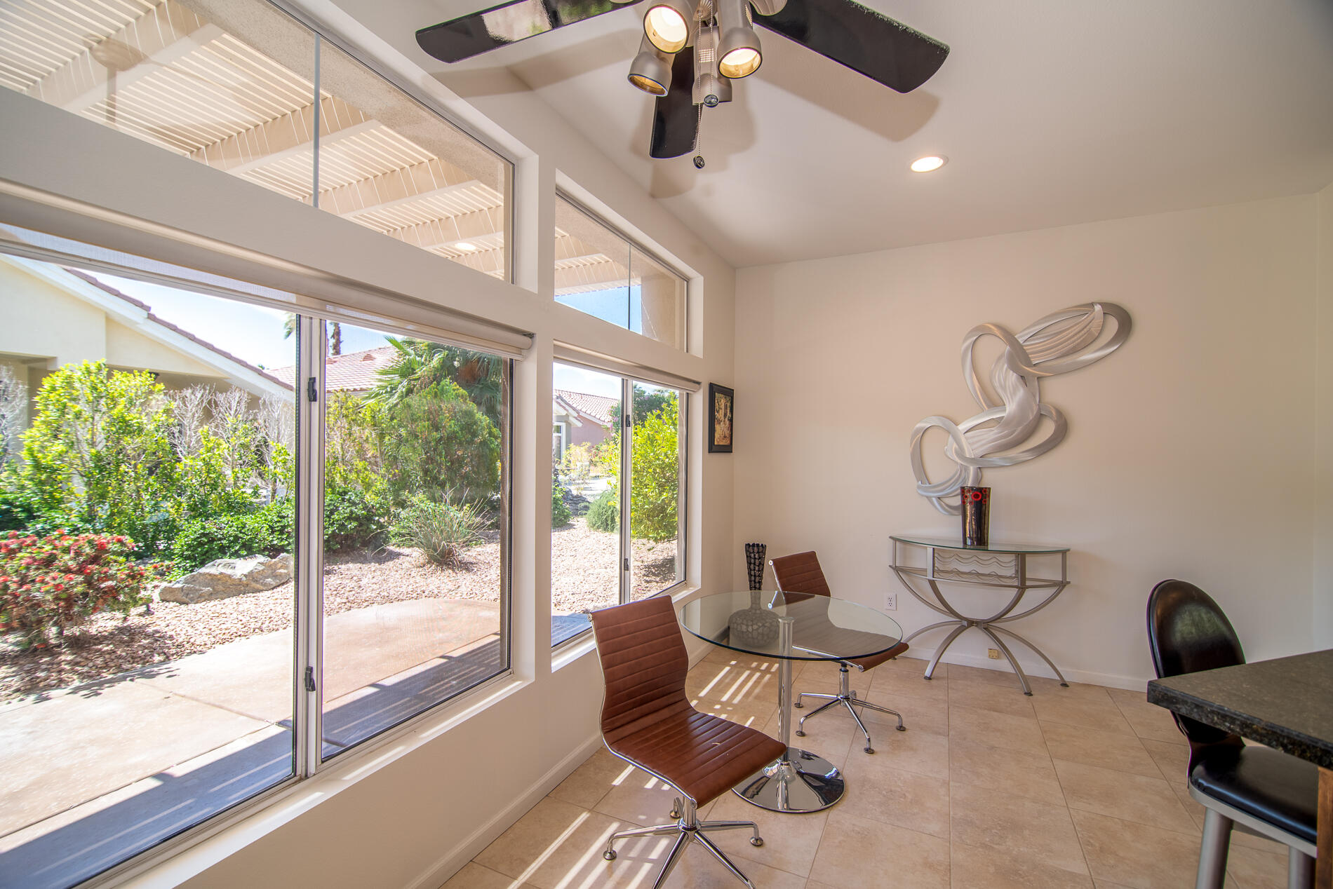 78379 Moongold Road Palm Desert, CA 92211 - Photo 21 of 40 a living room with furniture and a window