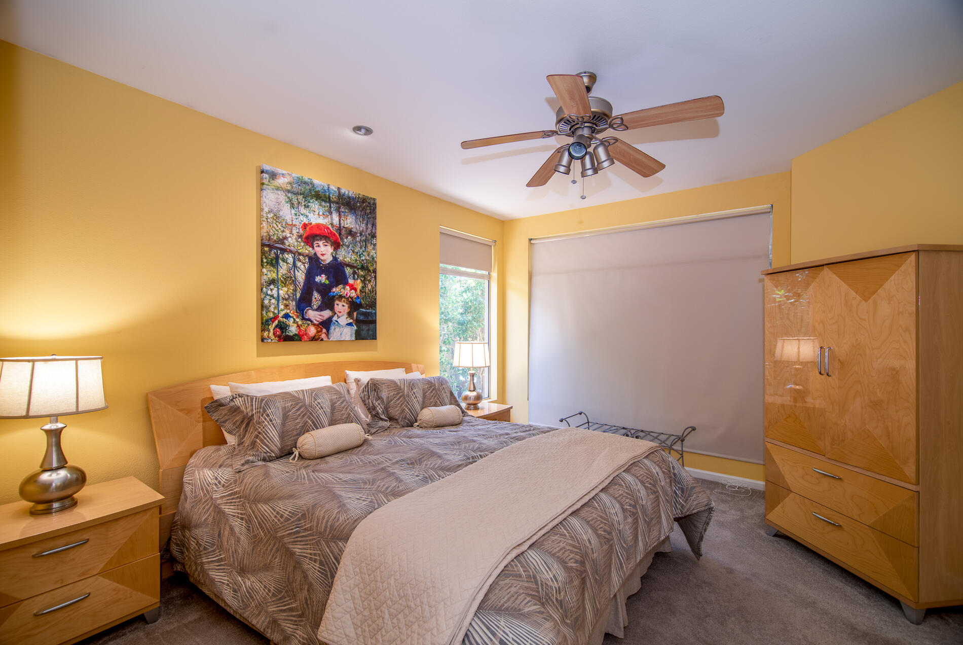 78379 Moongold Road Palm Desert, CA 92211 - Photo 27 of 40 a bedroom with a bed and cabinet