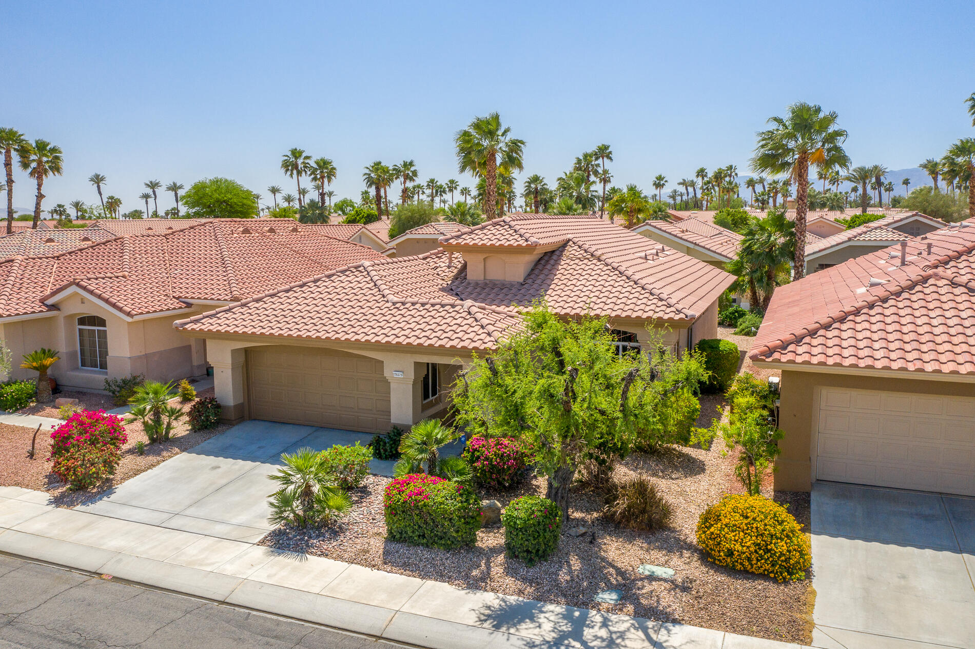 78379 Moongold Road Palm Desert, CA 92211 - Photo 31 of 40 a house with a yard and a outdoor space