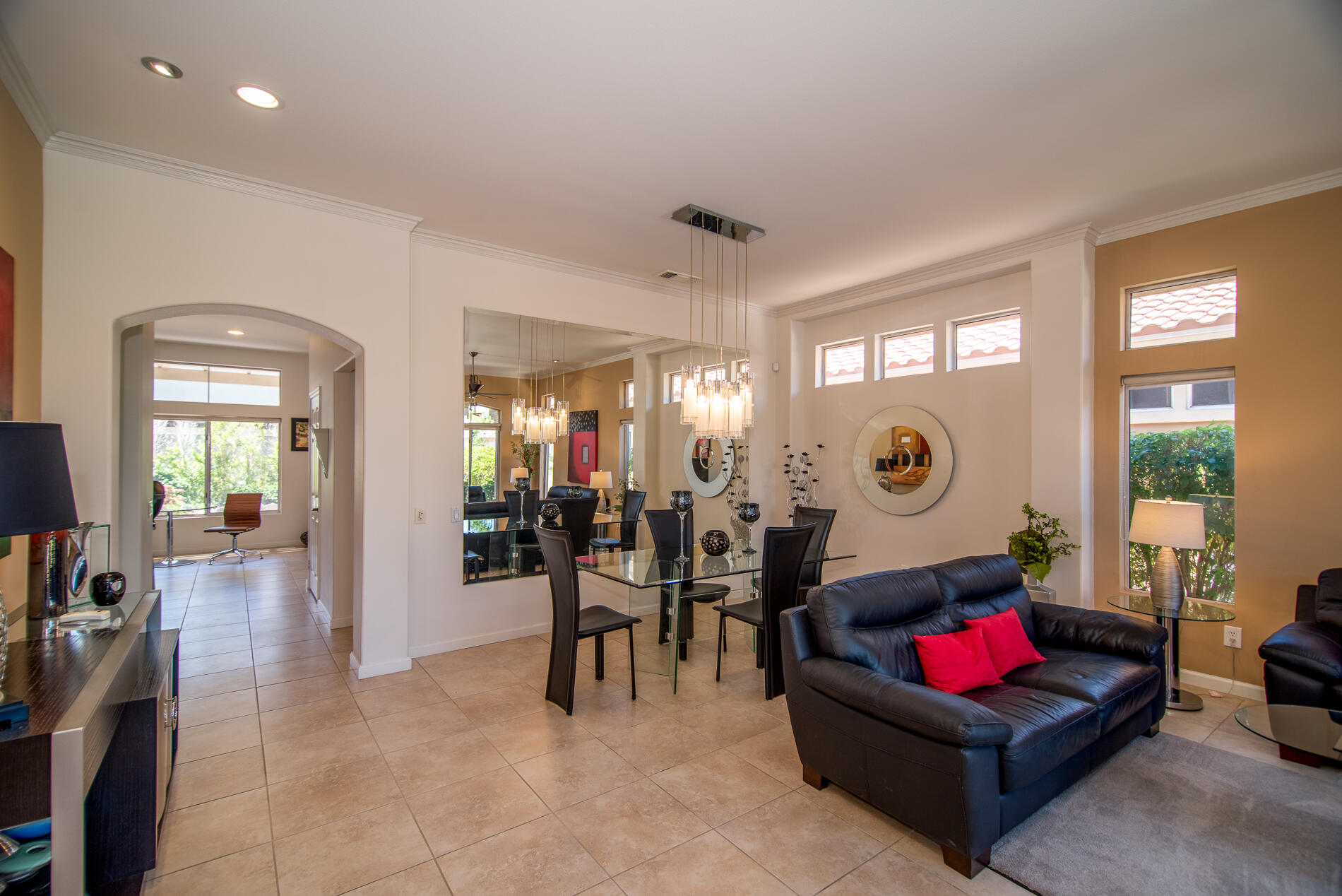 78379 Moongold Road Palm Desert, CA 92211 - Photo 10 of 40 a living room with furniture and a large window