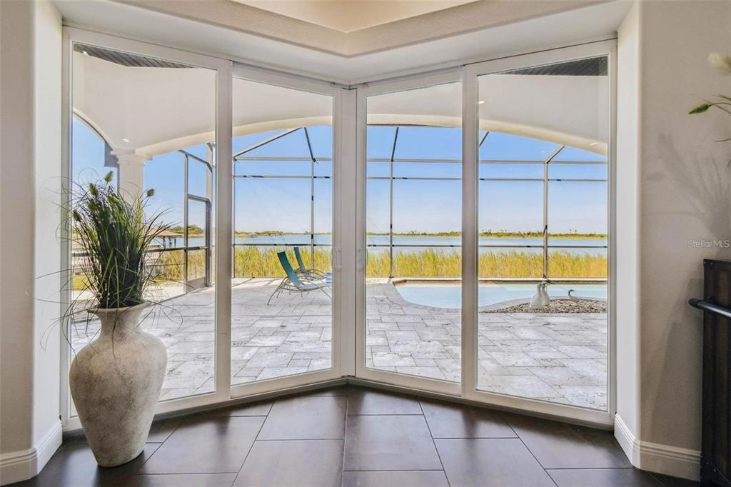 3215 Gulf City Road Ruskin, FL 33570 - Photo 14 of 99 a view of an entryway with a glass door