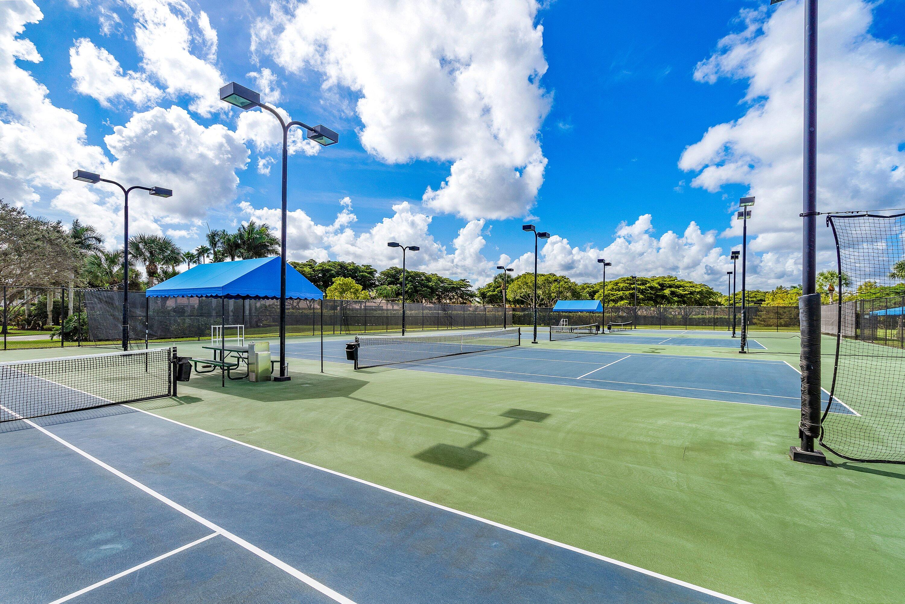 12403 Cascades Pointe Drive Boca Raton, FL 33428 - Photo 62 of 65 a view of a tennis ground