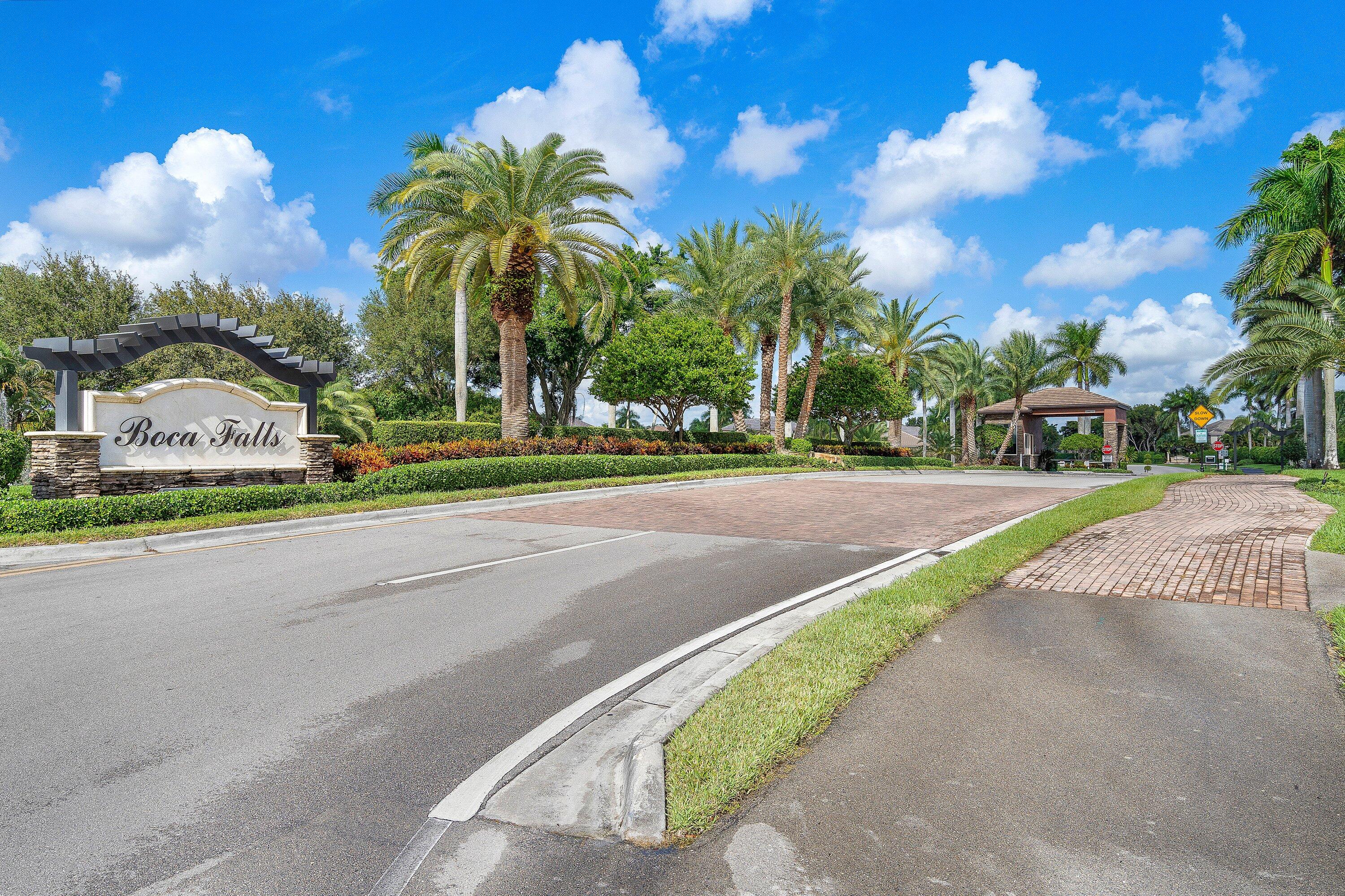 12403 Cascades Pointe Drive Boca Raton, FL 33428 - Photo 65 of 65 a view of a street with houses