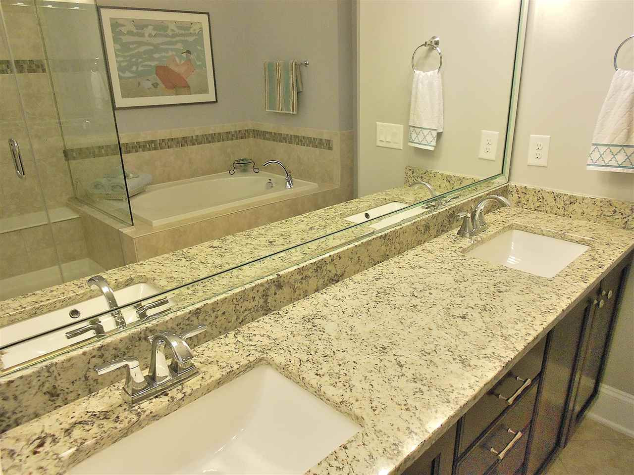 776 Fallon Grove Way Raleigh, NC 27608 - Photo 9 of 22 ...has double sinks in granite top, garden tub, and frameless glass shower Master Bath