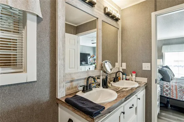 a view of a living room and a balcony