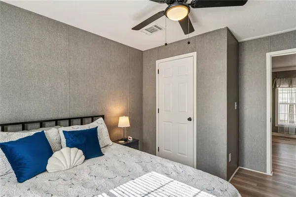 a view of a house with large windows