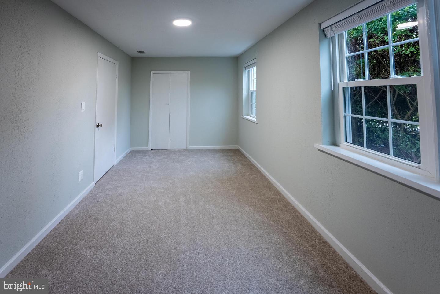 5629 Signal Point Court Burke, VA 22015 - Photo 15 of 48 an empty room with windows