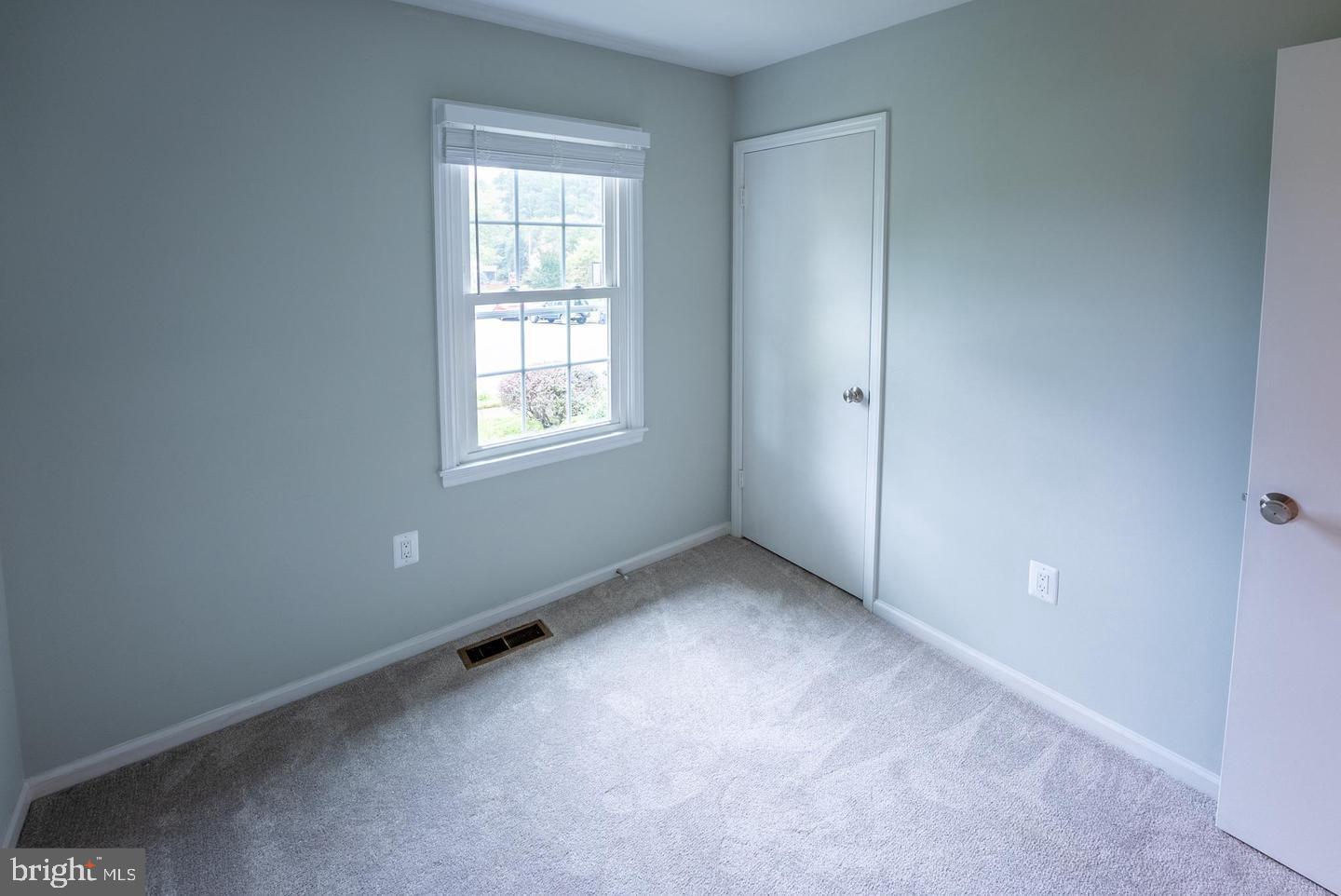 5629 Signal Point Court Burke, VA 22015 - Photo 20 of 48 an empty room with a window