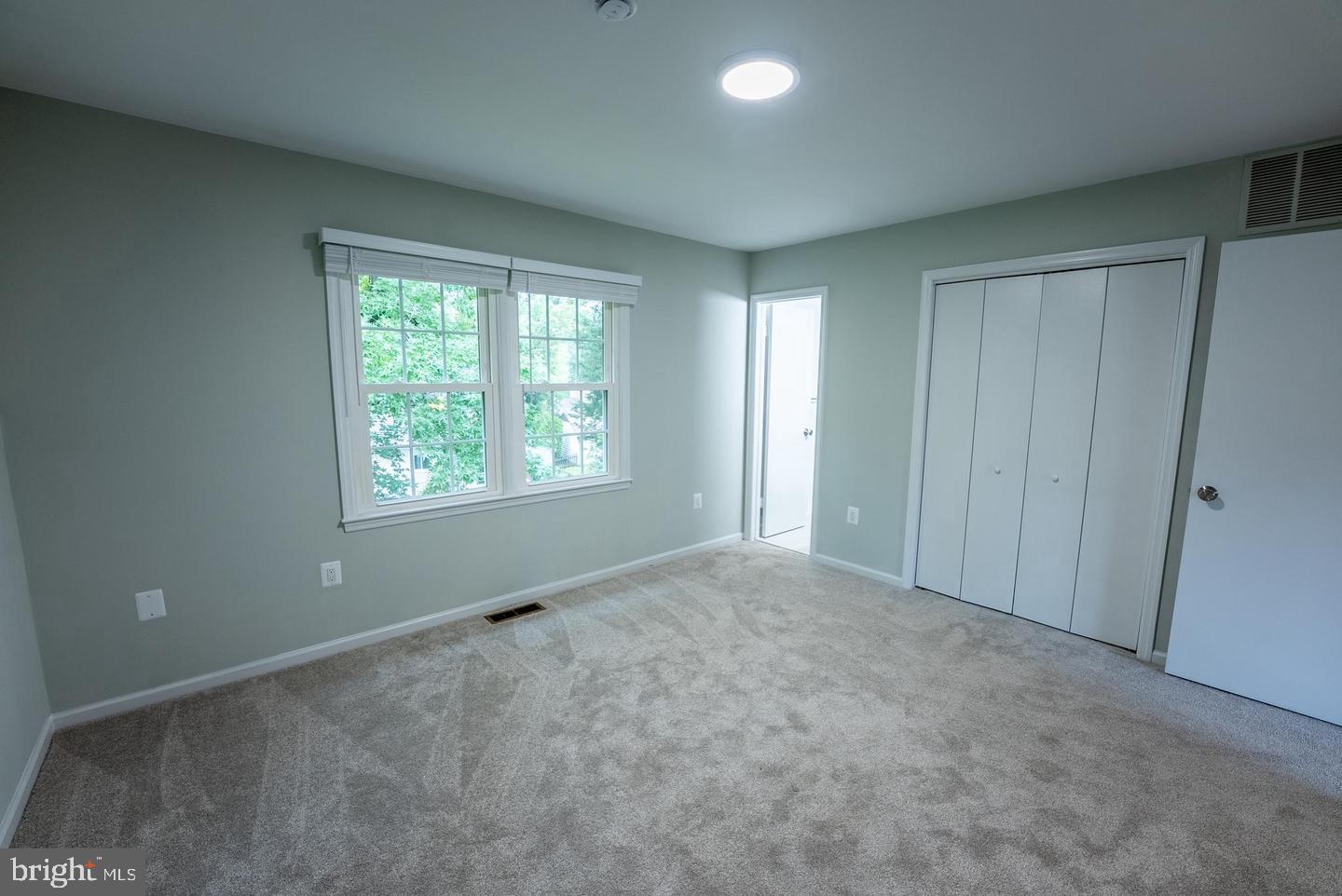 5629 Signal Point Court Burke, VA 22015 - Photo 24 of 48 an empty room with windows