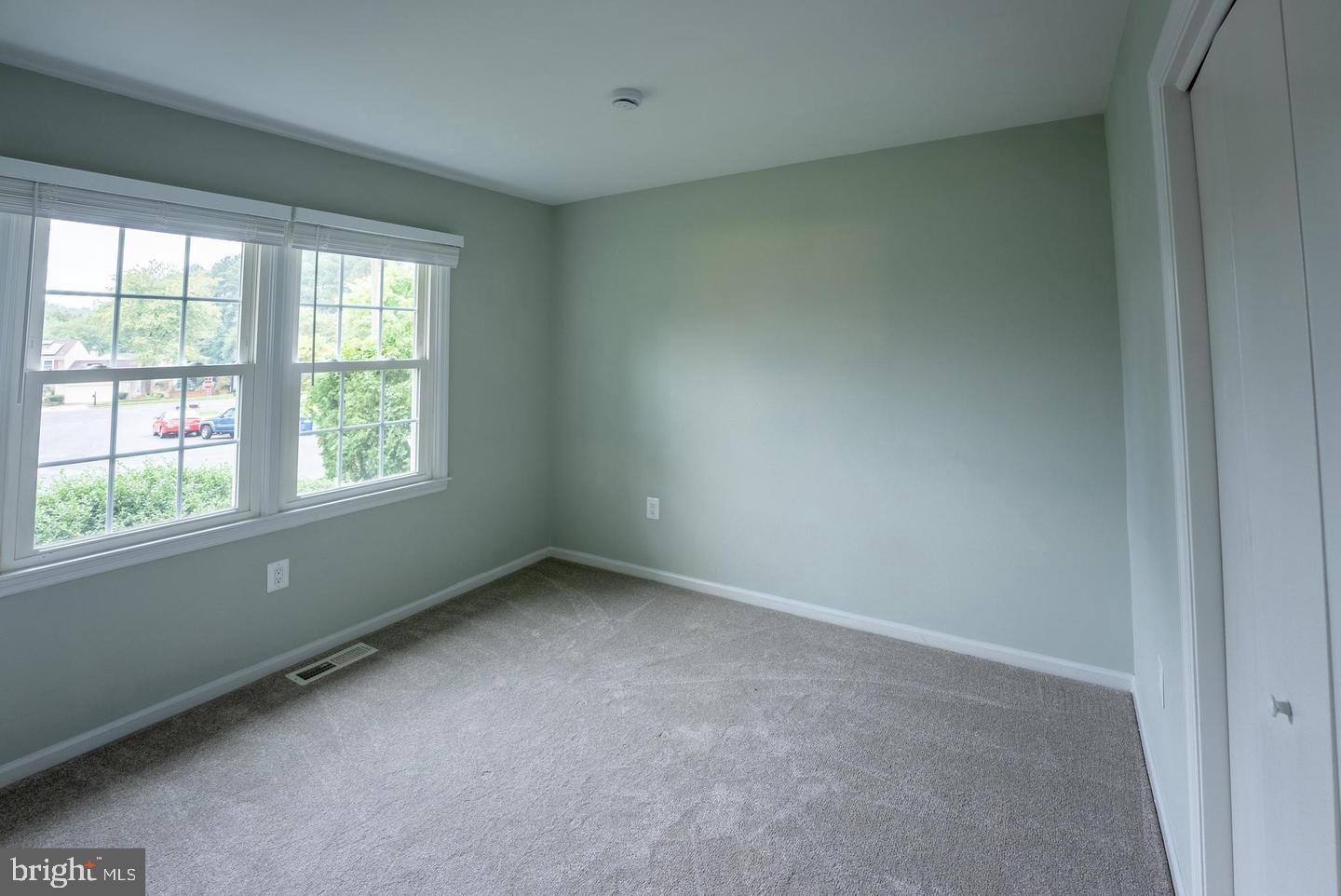 5629 Signal Point Court Burke, VA 22015 - Photo 29 of 48 an empty room with a window