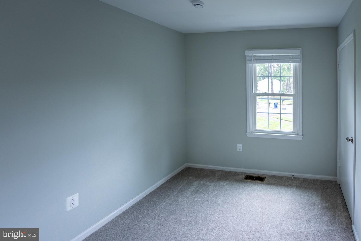 5629 Signal Point Court Burke, VA 22015 - Photo 38 of 48 an empty room with a window