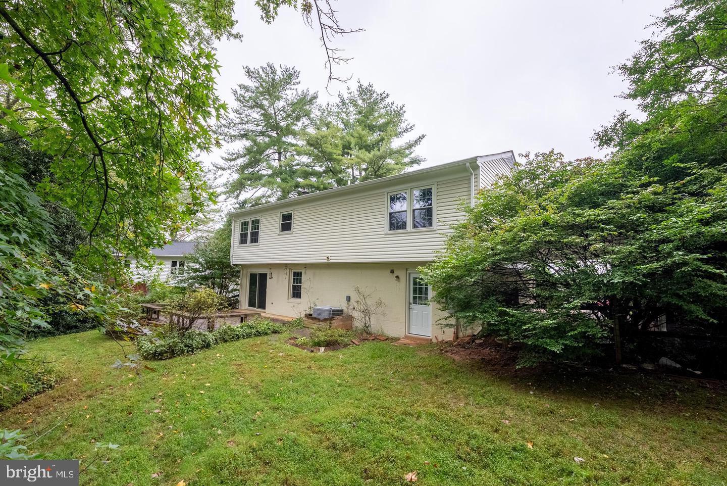 5629 Signal Point Court Burke, VA 22015 - Photo 46 of 48 a view of backyard of house with green space