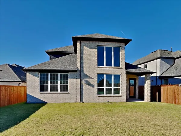 a view of a house with garden