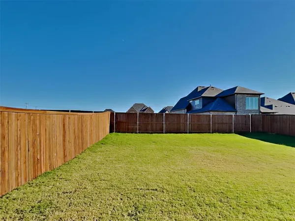 a view of an outdoor space and a yard