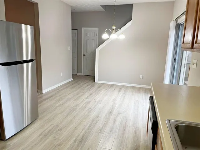 a view of livingroom with furniture and wooden floor