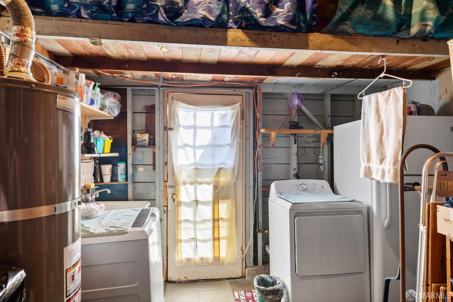 481 Rollins Road Burlingame, CA 94010 - Photo 16 of 16 a room with storage and utility