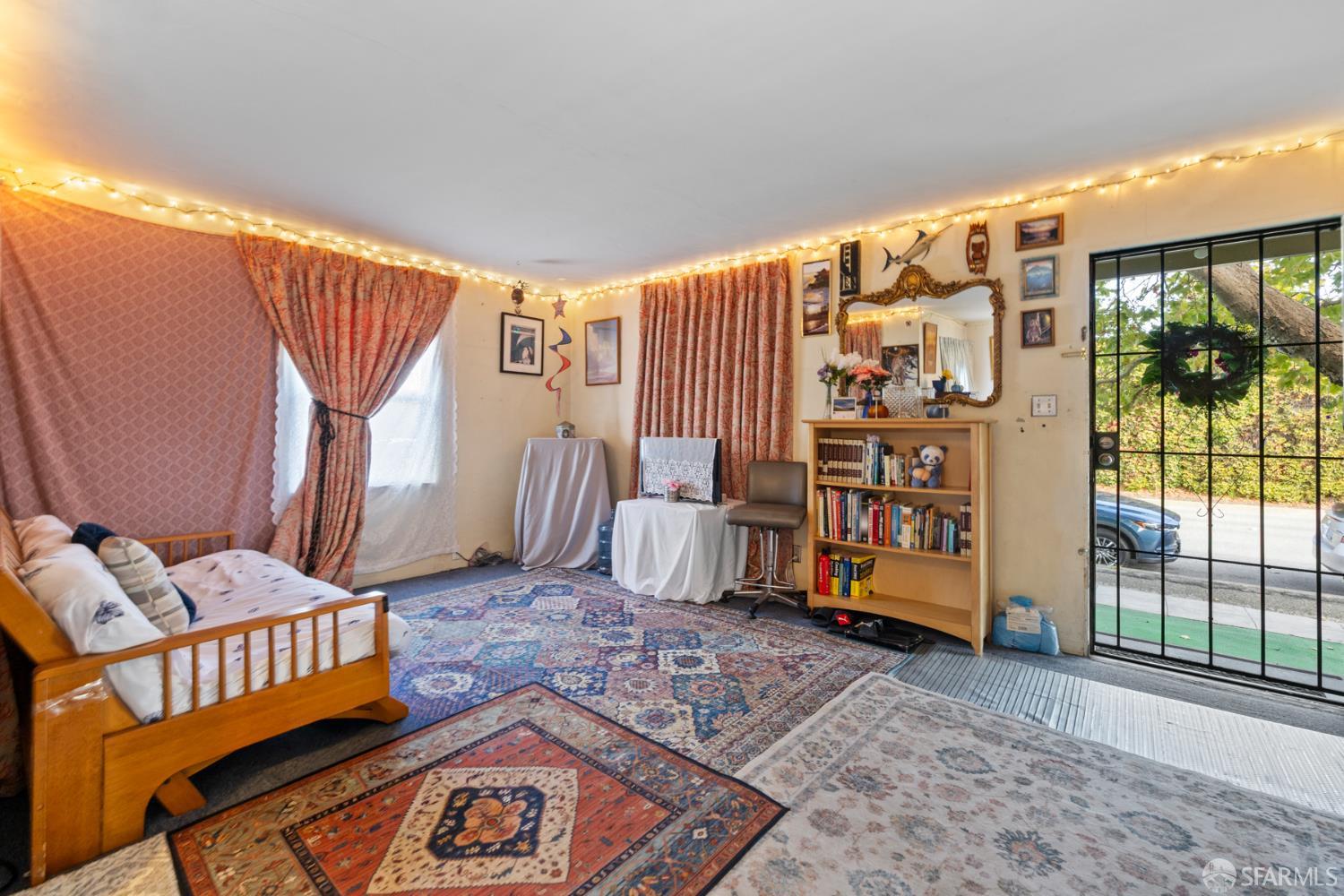 481 Rollins Road Burlingame, CA 94010 - Photo 2 of 16 a view of a bedroom with furniture and window