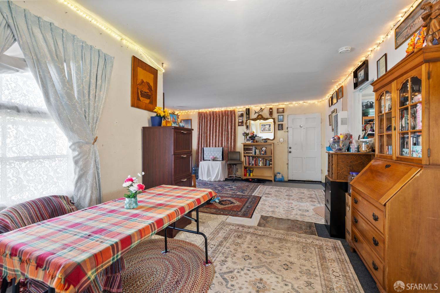 481 Rollins Road Burlingame, CA 94010 - Photo 5 of 16 a bedroom with a bed and wooden floor