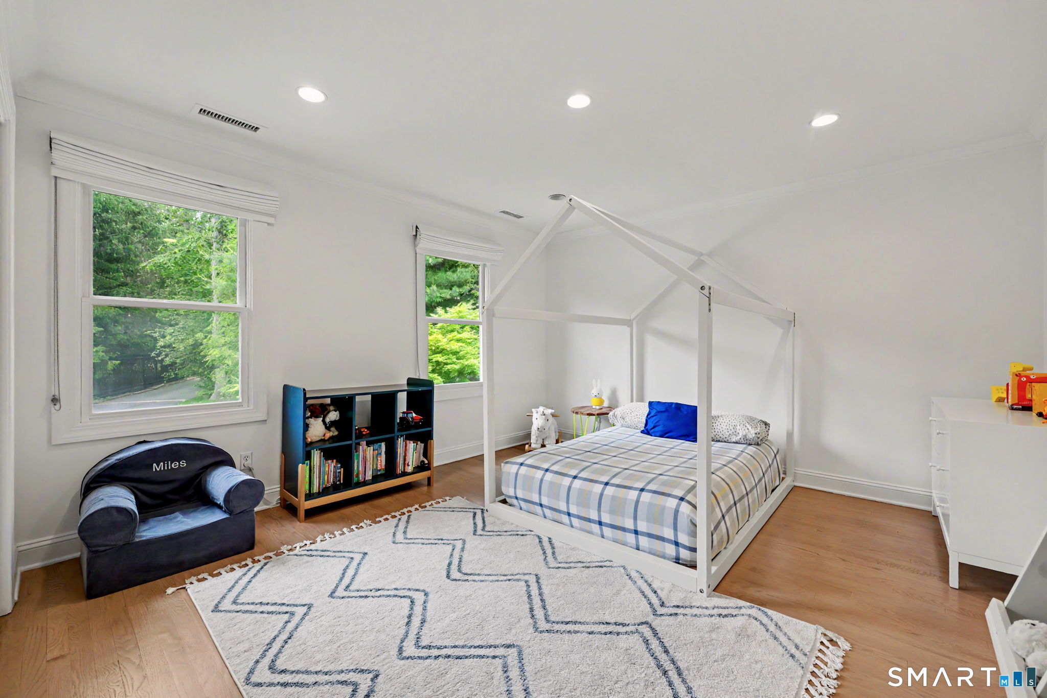 10 Side Hill Road Westport, CT 06880 - Photo 29 of 40 a bedroom with double bed and a window