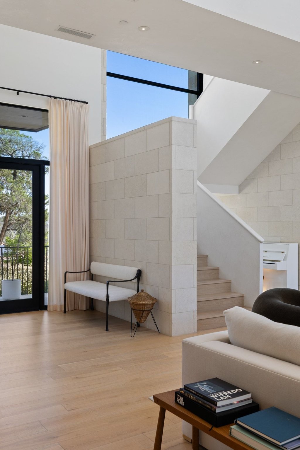 5 Inwood Cove Austin, TX 78746 - Photo 23 of 39 Living area with light wood-style floors and a high ceiling