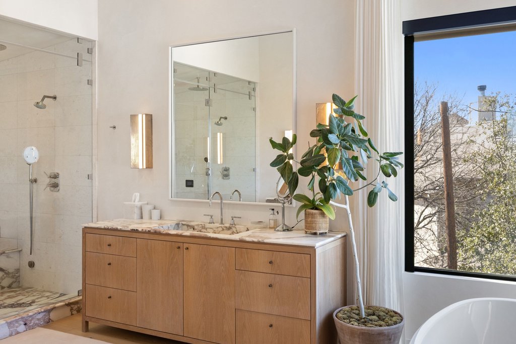 5 Inwood Cove Austin, TX 78746 - Photo 27 of 39 Full bath featuring vanity, a shower stall, and a freestanding bath