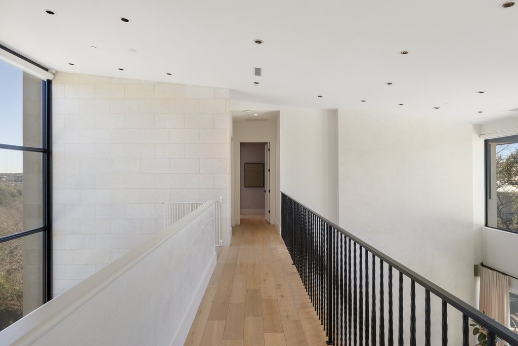 5 Inwood Cove Austin, TX 78746 - Photo 29 of 39 Hall with light wood-type flooring