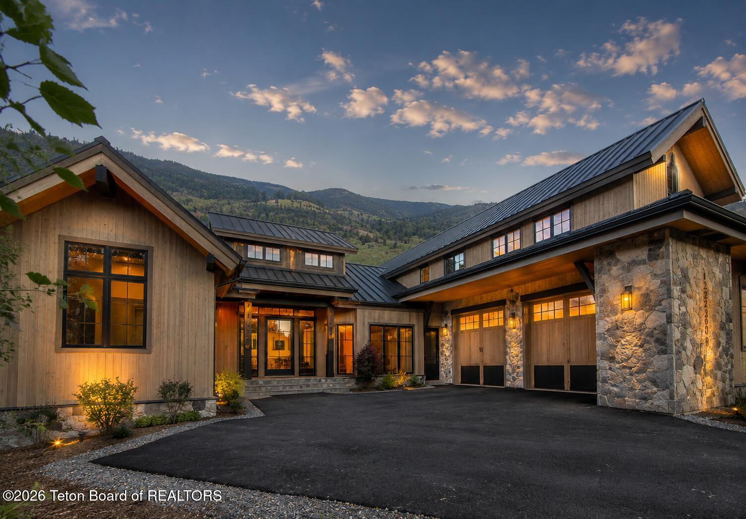 56 Rammell Road Victor, ID 83455 - Photo 1 of 28 Exterior with Driveway AI