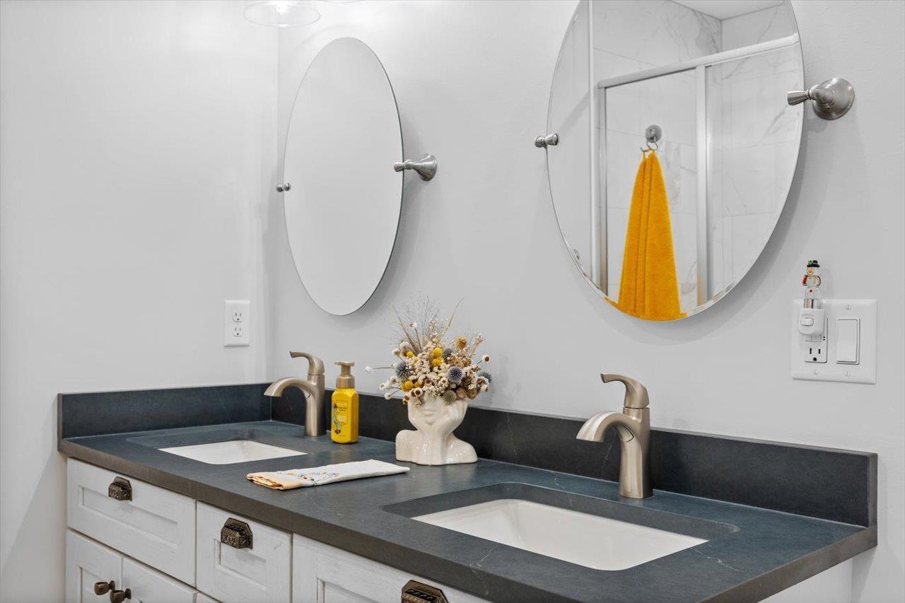 7 Oak View Drive Staunton, VA 24401 - Photo 23 of 53 a bathroom with a granite countertop sink a mirror and a potted plant