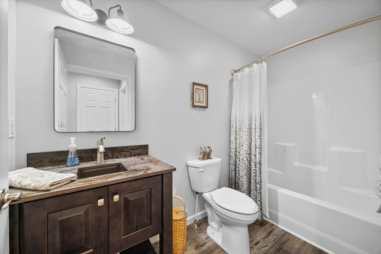 7 Oak View Drive Staunton, VA 24401 - Photo 28 of 53 a bathroom with a granite countertop toilet sink and mirror