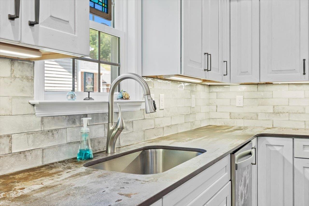 7 Oak View Drive Staunton, VA 24401 - Photo 9 of 53 a kitchen with stainless steel appliances granite countertop a sink and a window