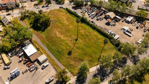 a view of a yard with swimming pool