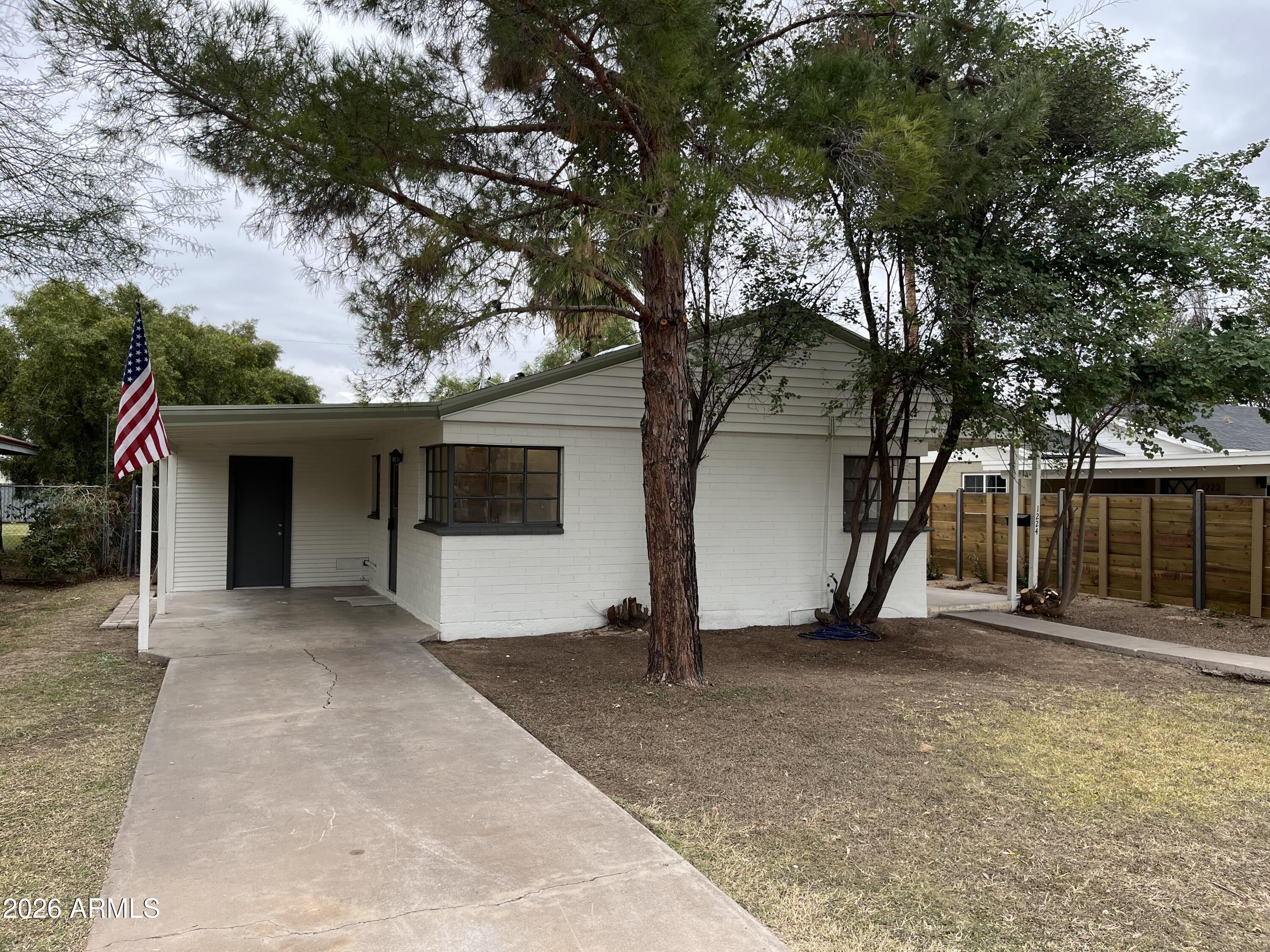 1226 South Roosevelt Street Tempe, AZ 85281 - Photo 1 of 26 a view of house with backyard and trees