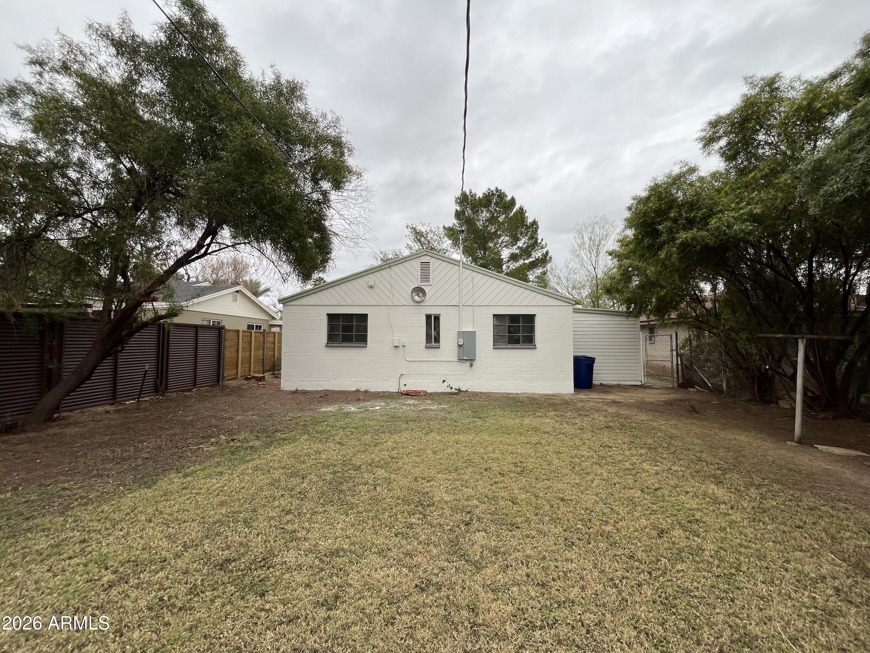 1226 South Roosevelt Street Tempe, AZ 85281 - Photo 21 of 26 a view of a house with a backyard