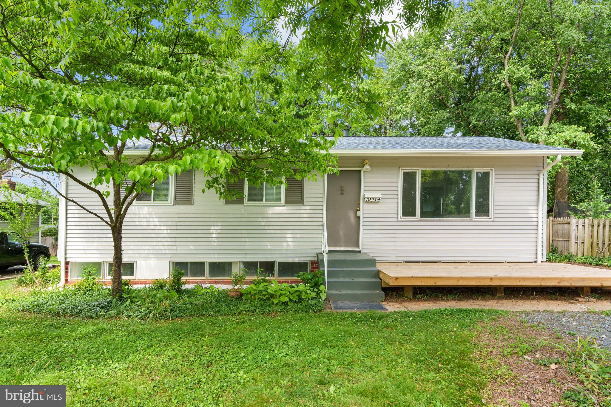10204 Rodgers Road Fairfax, VA 22030 - Photo 3 of 29 a view of a house with a yard