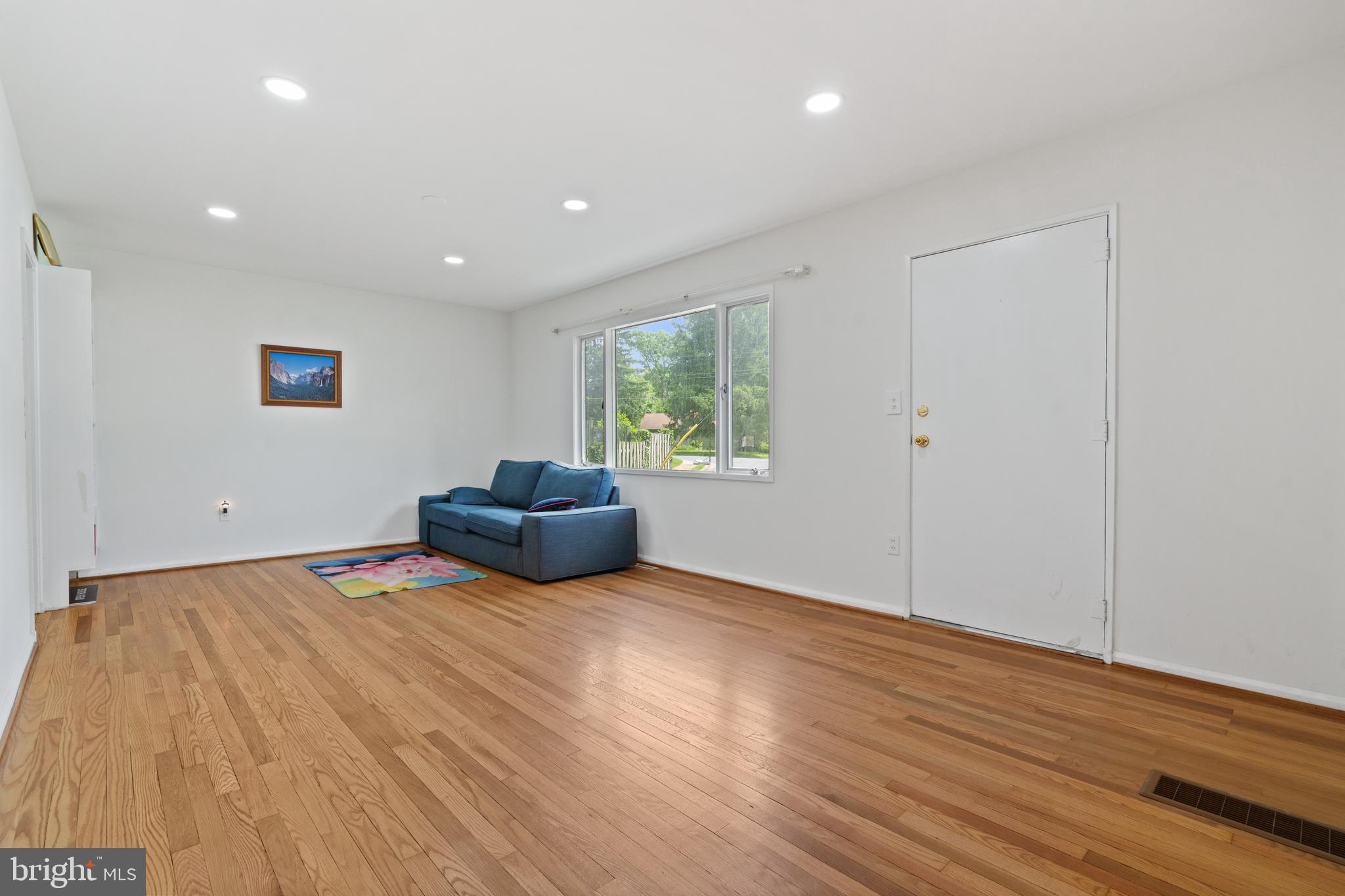 10204 Rodgers Road Fairfax, VA 22030 - Photo 4 of 29 a view of a livingroom with furniture and a window