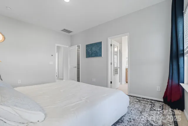 a bathroom with a sink vanity and a mirror