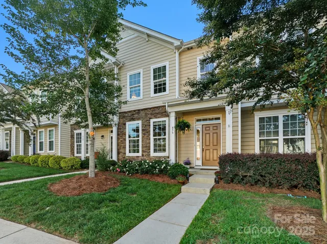 front view of a house and a yard