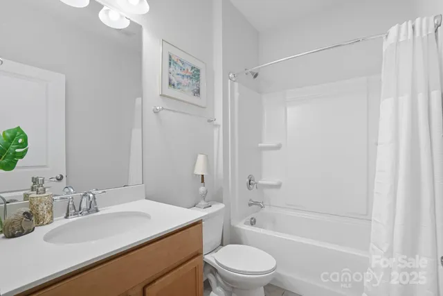 a view of a patio with table and chairs a barbeque grill with wooden fence