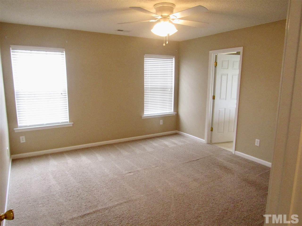 7420 Lowell Ridge Road Raleigh, NC 27616 - Photo 14 of 21 a view of an empty room with a window