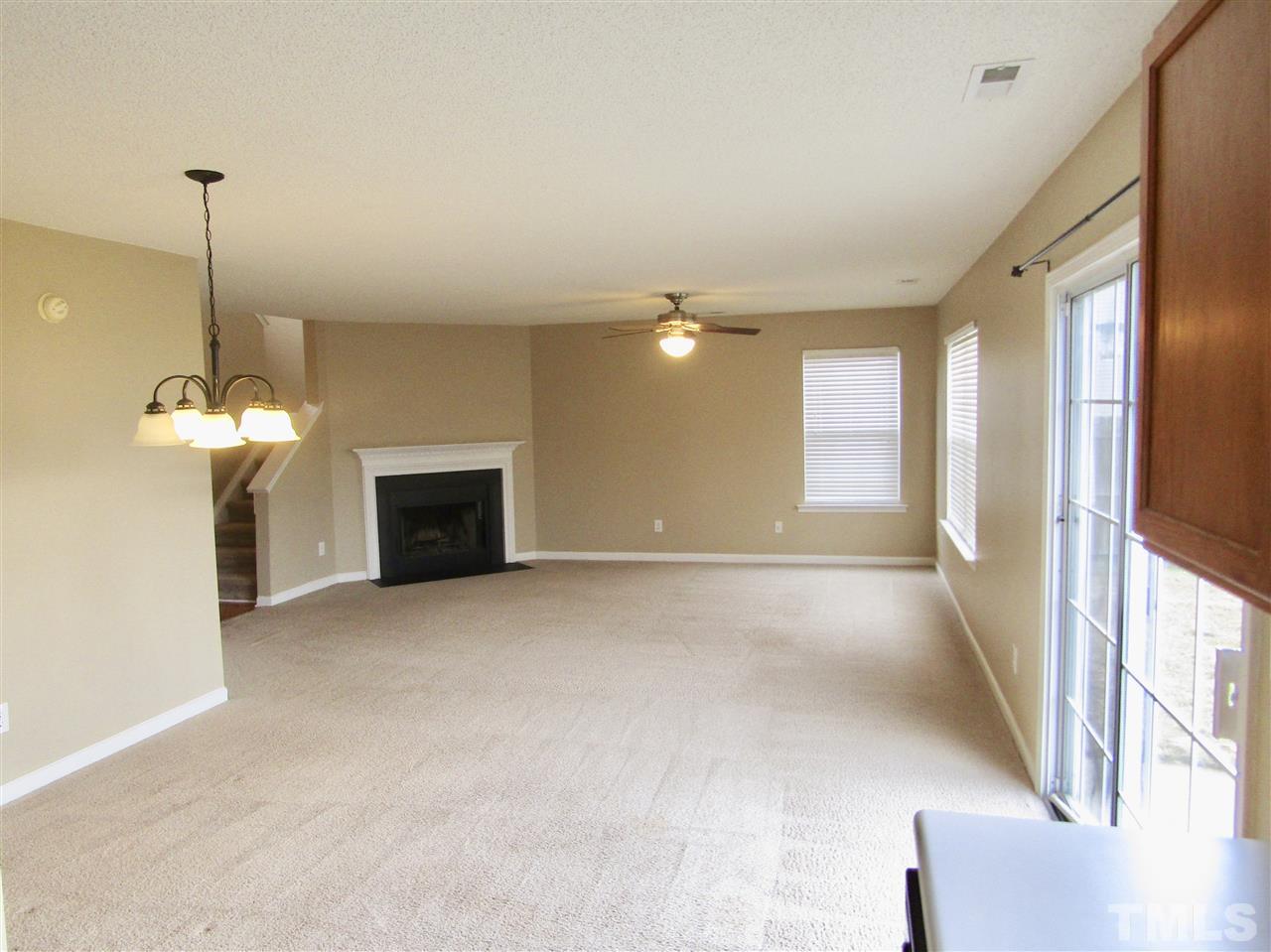 7420 Lowell Ridge Road Raleigh, NC 27616 - Photo 5 of 21 a view of a livingroom with a fireplace