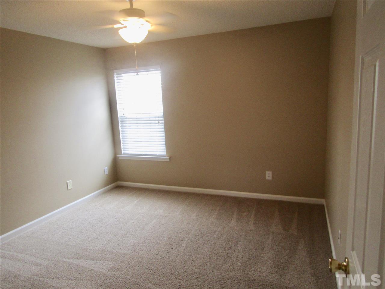 7420 Lowell Ridge Road Raleigh, NC 27616 - Photo 9 of 21 an empty room with a window