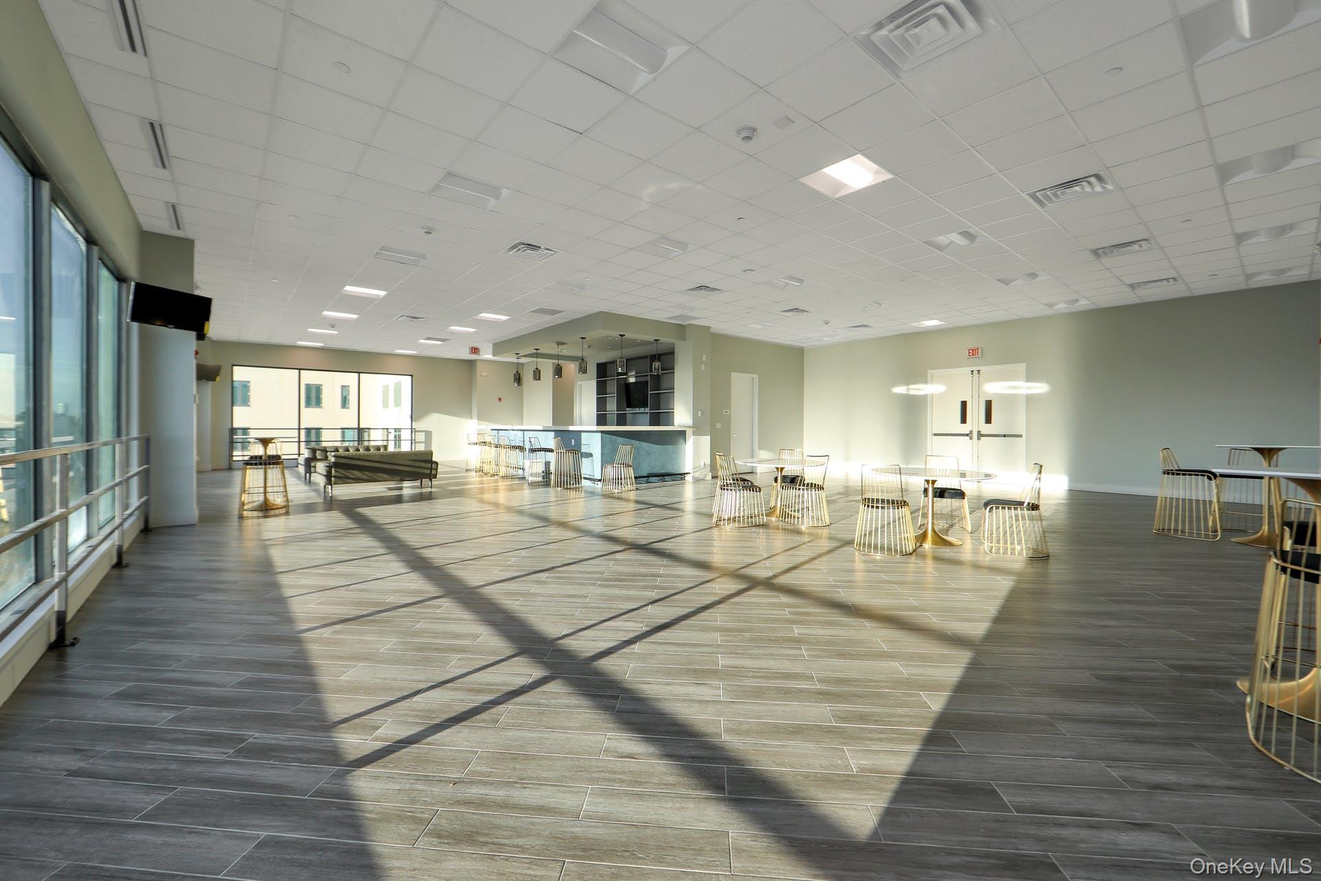 701 Ridge Hill Boulevard, Unit PHE Yonkers, NY 10710 - Photo 8 of 11 Lobby featuring a drop ceiling